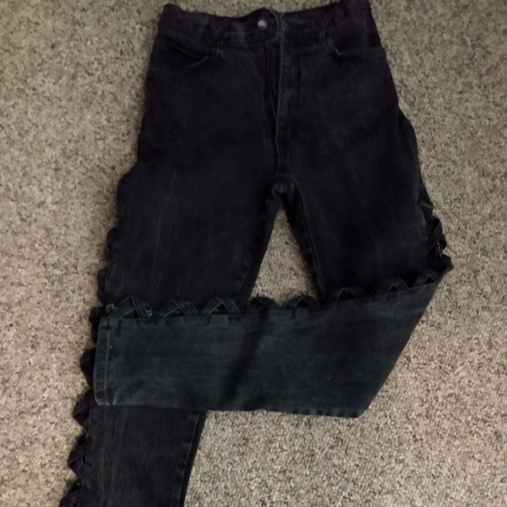 Women's vintage LA 37 jeans, size true 7, high waisted, criss cross open leg.